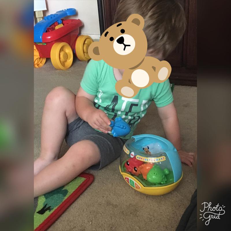 Playing with his new toy