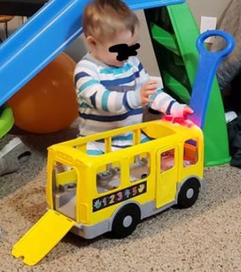 Learning how to lift up the holding bar to pull the bus