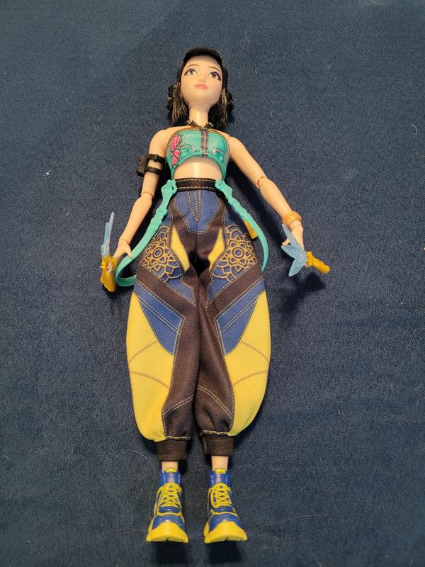 The doll with accessories attached