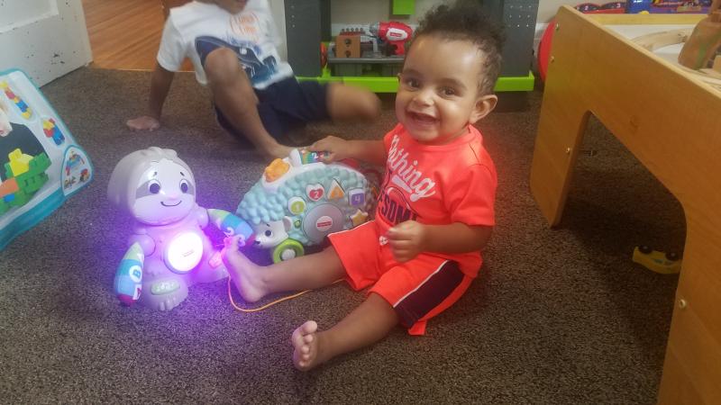 Playing with the toys on top