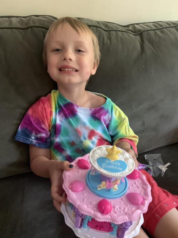 Happy kid with his new Polly Pocket