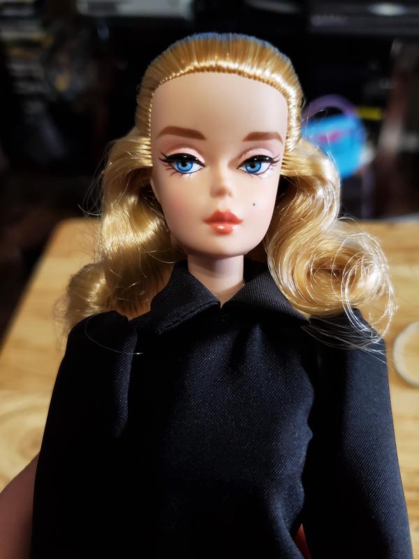 black barbie doll with blonde hair