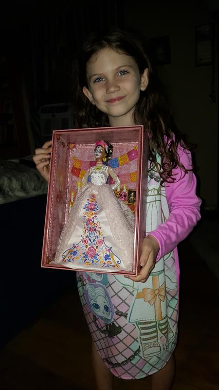 Happy with her Barbie