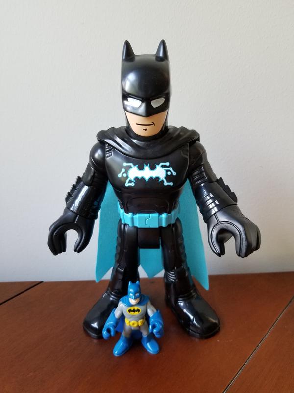 Size comparison to a normal Imaginext Batman figure that we already had.