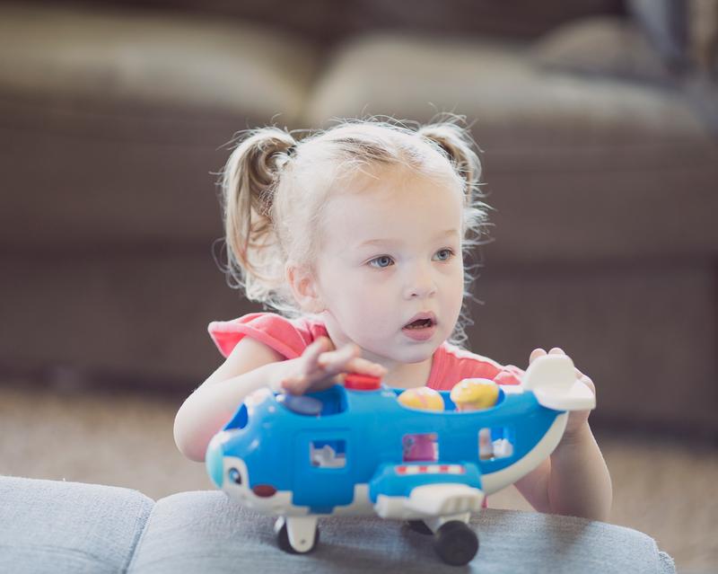 Pushing the button to hear the pilot.