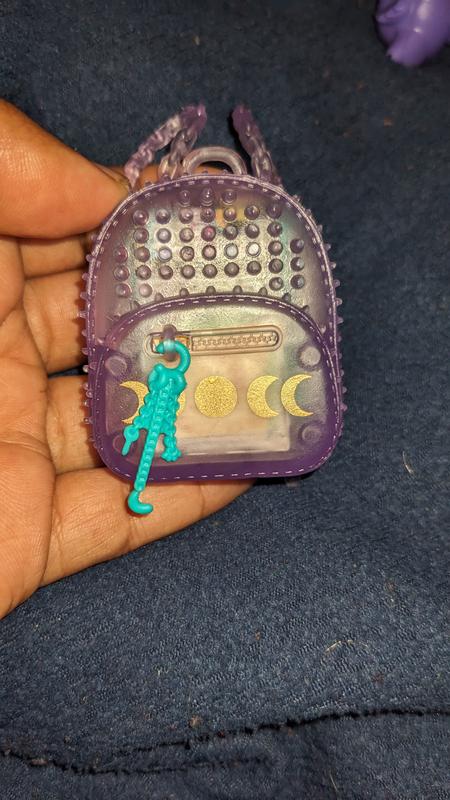 The adorable backpack with items inside