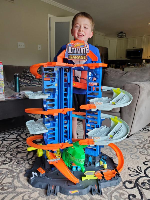 Hot Wheels Ultimate Garage Track Set with 2 Toy Cars, Hot Wheels  City Playset with Multi-Level Side-by-Side Racetrack, Moving T-Rex Dino & Hot  Wheels Storage for 100+ 1:64 Vehicles ( Exclusive) 