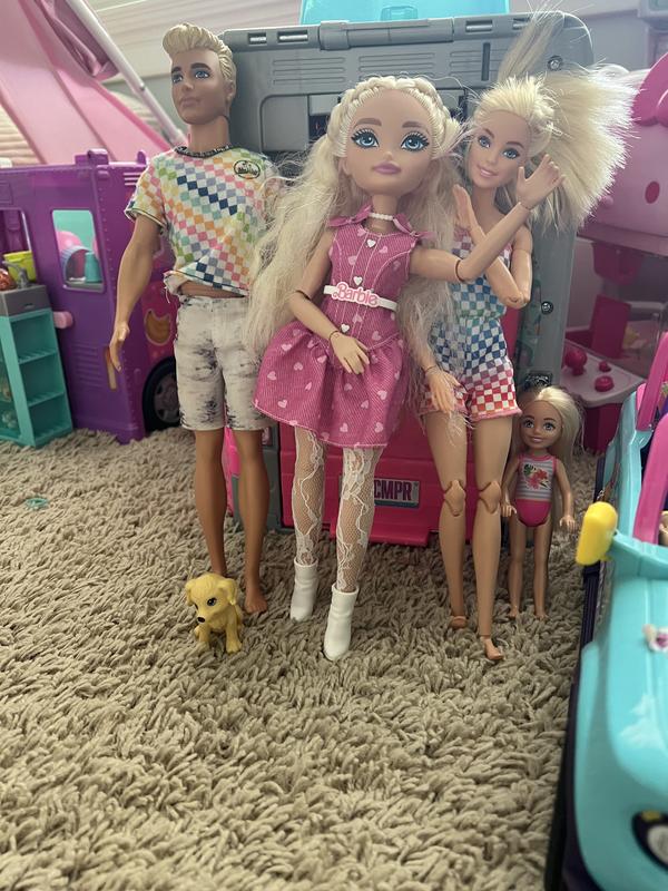 Customer photo for "Cute and fun, not the same size as regular Barbie"