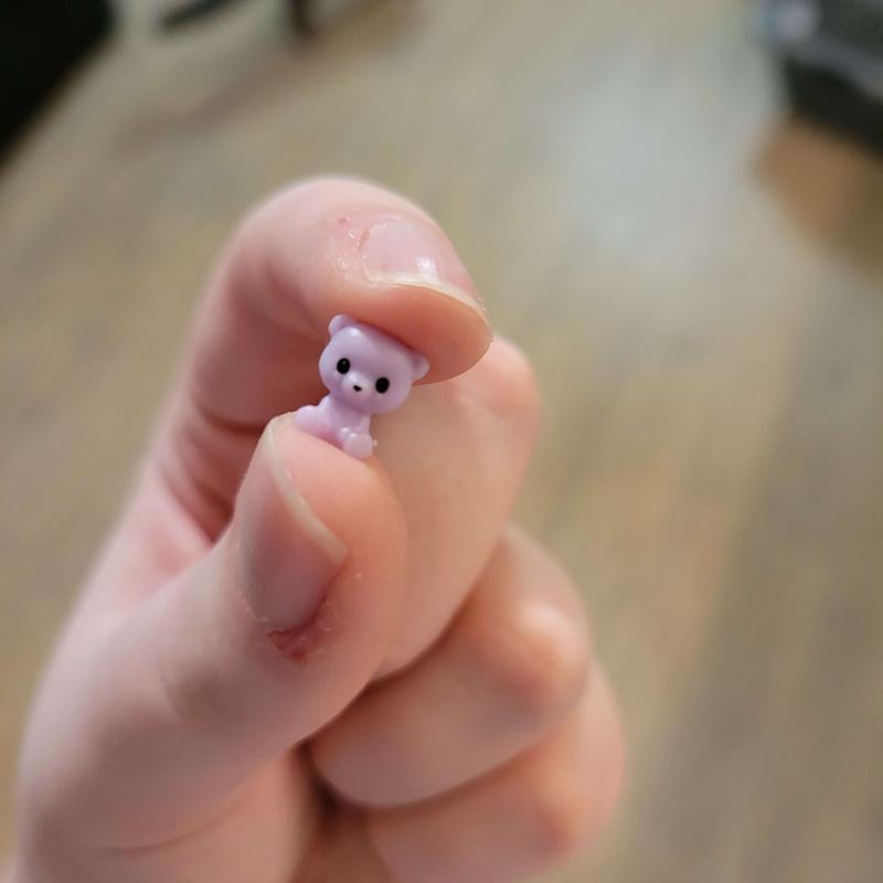 A very very small purple cat
