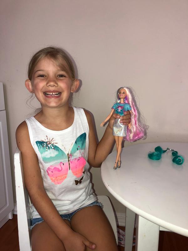 So many smiles as she swaps out accessories.