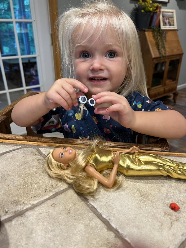 Me and my new Barbie with a cute outfit and glasses!