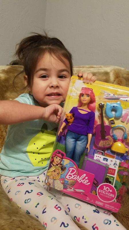 My daughter with her Daisy barbie doll