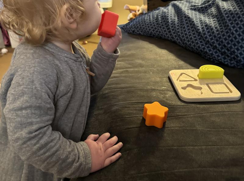 Pictured is my son mouthing on one of the puzzle pieces as I described in my review.