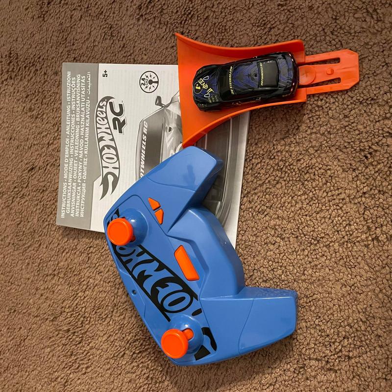 Remote, car and piece of track out of the package