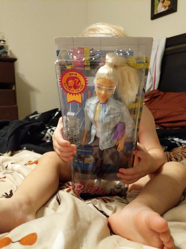 She's very excited for her new Barbie