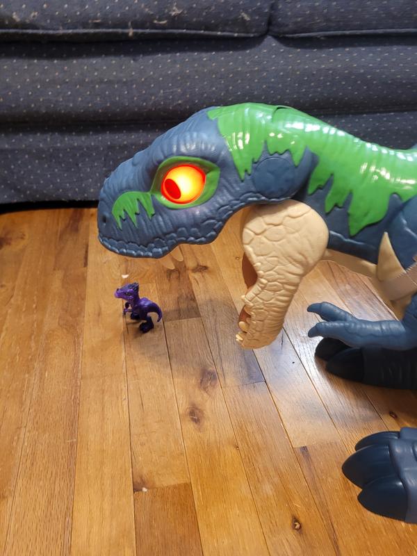 The dino's mouth opens very wide when squeezing the tail.