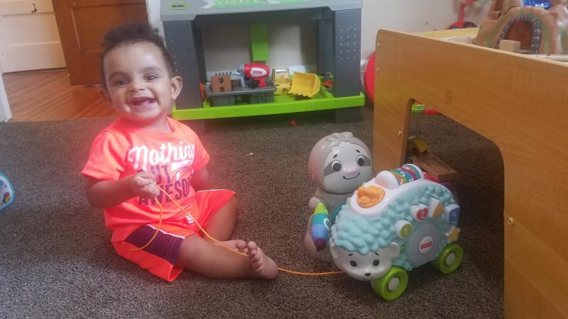 Laughing while pulling his Hedgehog