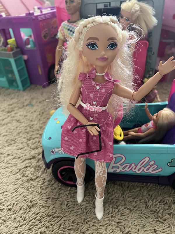 Customer photo for "Cute and fun, not the same size as regular Barbie"