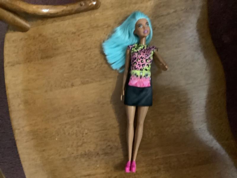 Bright Blue Hair Makes Her Stand Out!