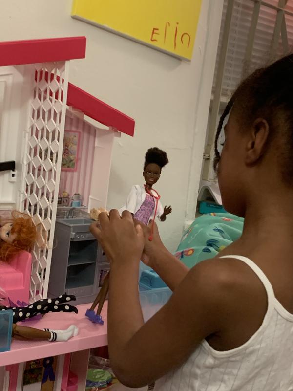 Vet doll in Barbie house