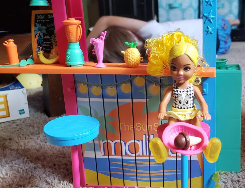 Chelsea enjoying her ice cream cone in the tray! Blender has removable lid, just like pineapple!