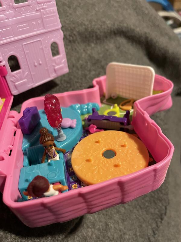 View of the soccer goal with the ball in the net