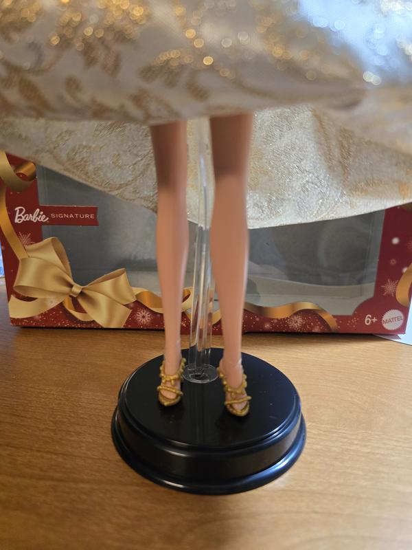 Comes with stand to display Barbie