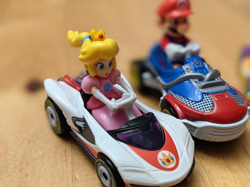 Princess Peach & Mario in their karts