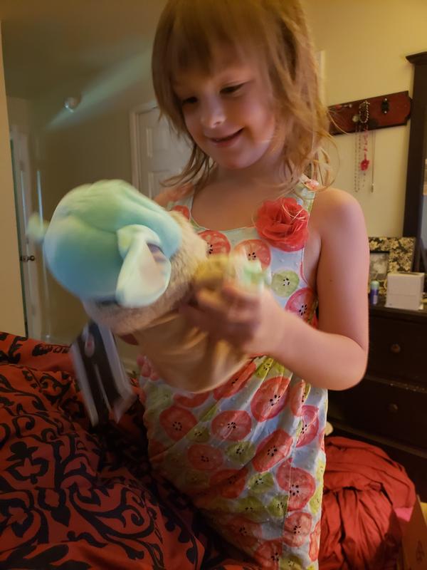 Happy child with her Child toy