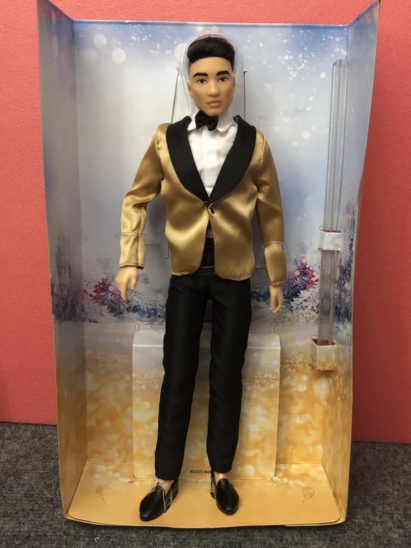 His doll stand is hidden within the background liner