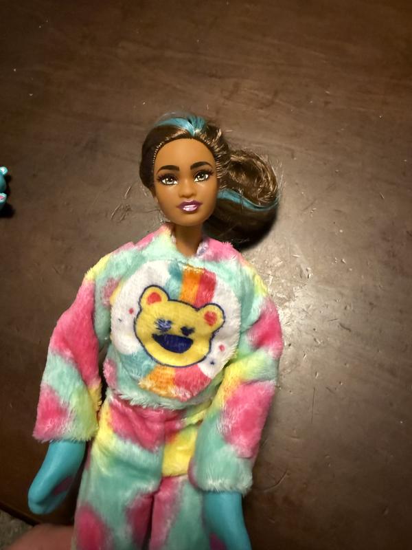 Doll out of package with care bear head removed