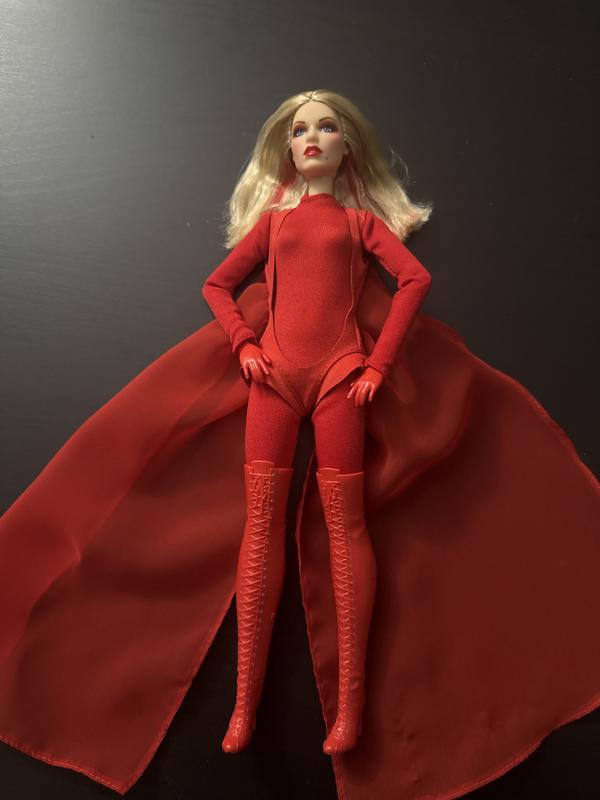Kylie Minogue Barbie in red with thigh high boots