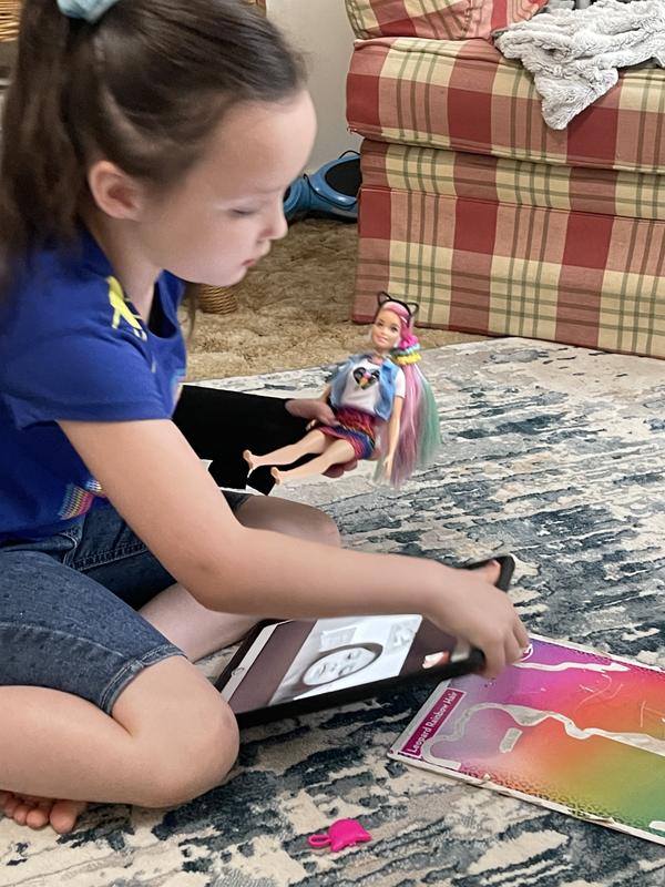 Sharing Barbie time with a cousin