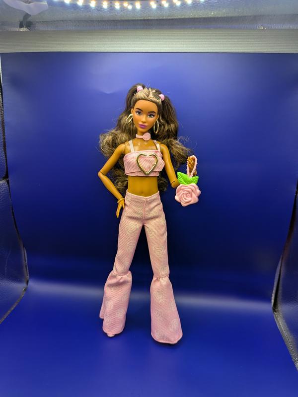 Doll cannot stand alone, she's leaning but so easy to pose!