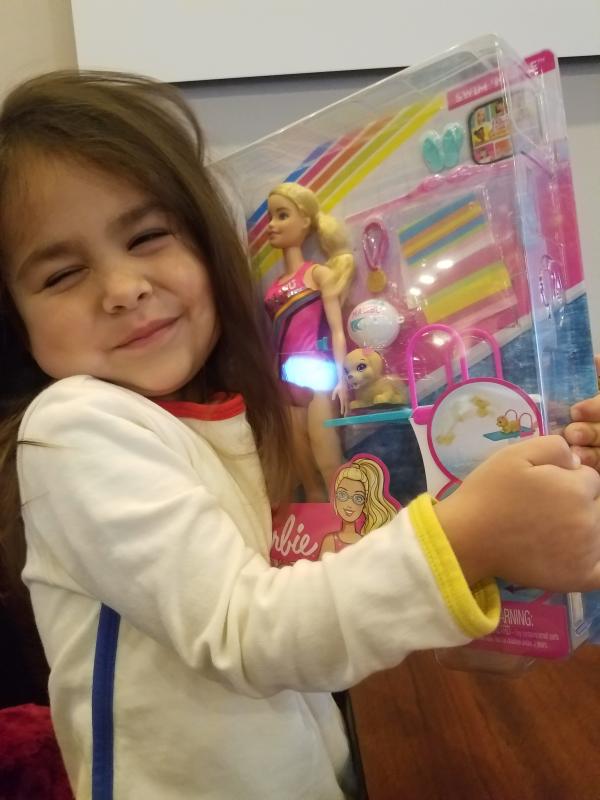 Opening her surprise Barbie!