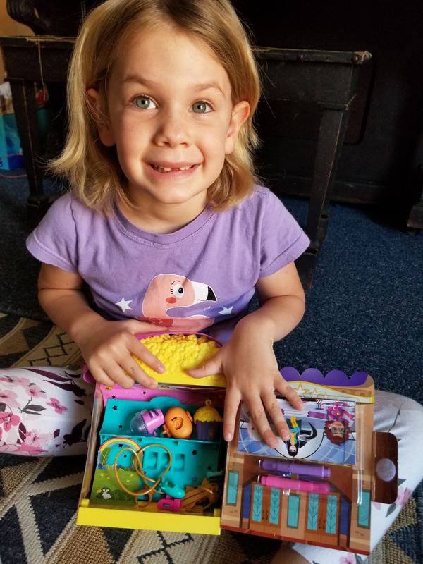 Loves to show her family members what is inside!