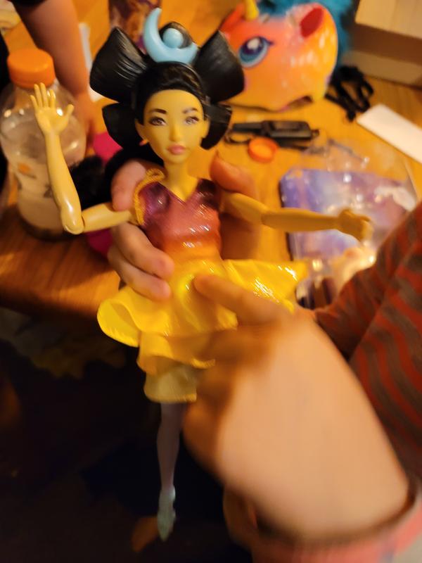 Press tummy she sings