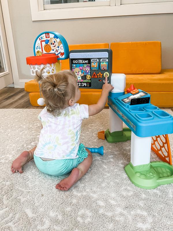 Pushing the buttons to hear the fun sounds!