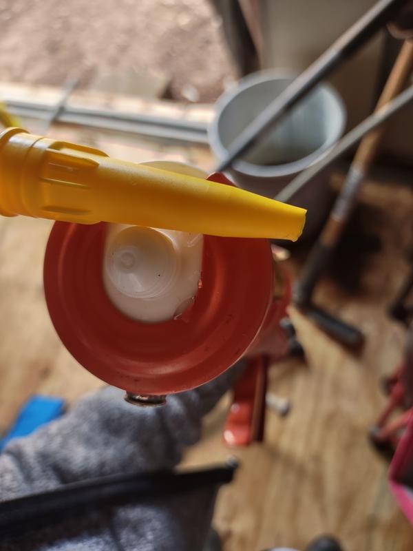 Remove yellow lid, and open with knife or nail.