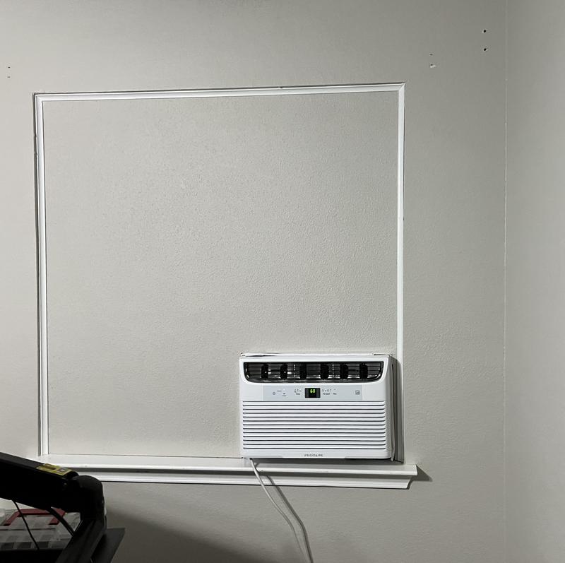 Conversion of a window into a wall for this cool little unit!