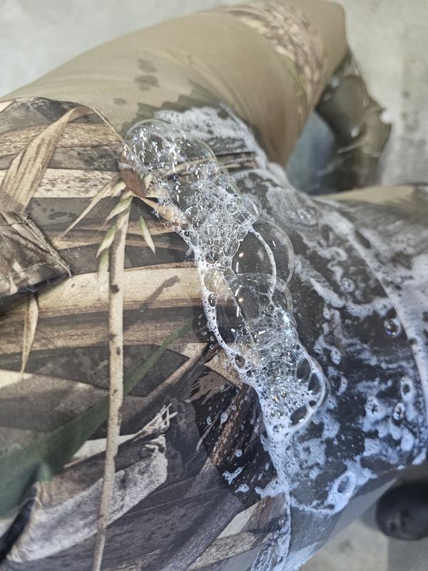 Photos of soaped joints showing leaks along multiple seams