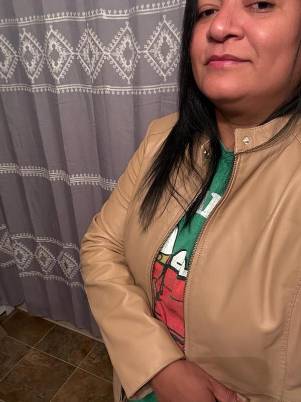 Customer photo for "Premium feel, quality lining and pockets, easy care, and true value — this Cole Haan jacket is worth the investment."