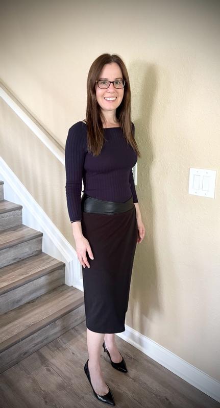 Customer photo for "A unique twist on a classic black skirt looks great with a fitted top"