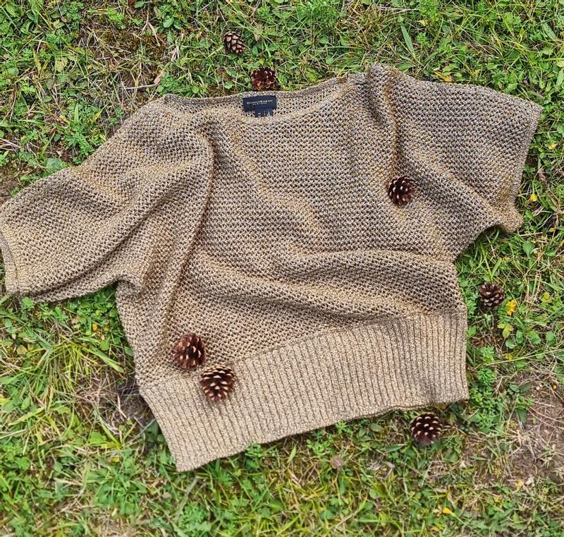 Customer photo for "Cozy and stylish knit sweater with a warm earthy tone, soft texture, and a relaxed fit."