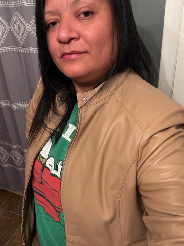 Customer photo for "Premium feel, quality lining and pockets, easy care, and true value — this Cole Haan jacket is worth the investment."