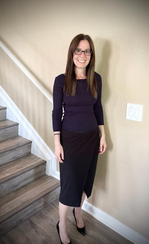 Customer photo for "A unique twist on a classic black skirt looks great with a fitted top"