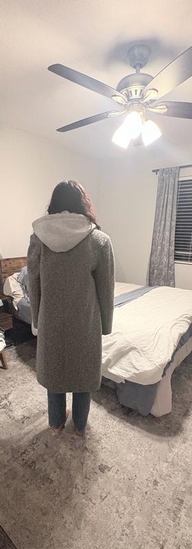 Customer photo for "Timeless Style, But Runs Small."