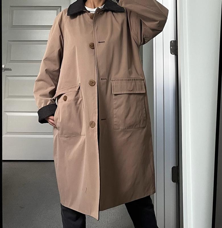 Customer photo for "Lightweight, easy to pack, and practical, with roomy pockets that make it perfect for travel and rainy days."