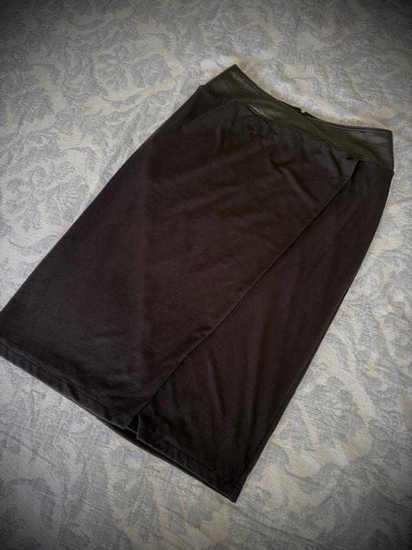 Customer photo for "A unique twist on a classic black skirt looks great with a fitted top"