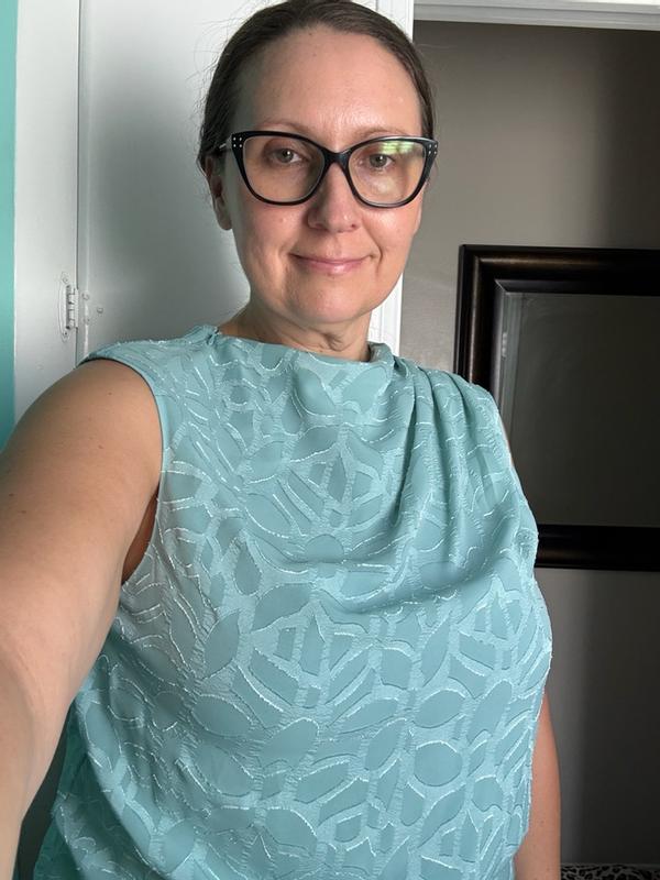 Customer photo for "Beautiful top, just size up"
